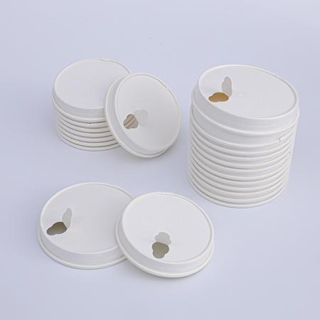 White paper coffee cup lids